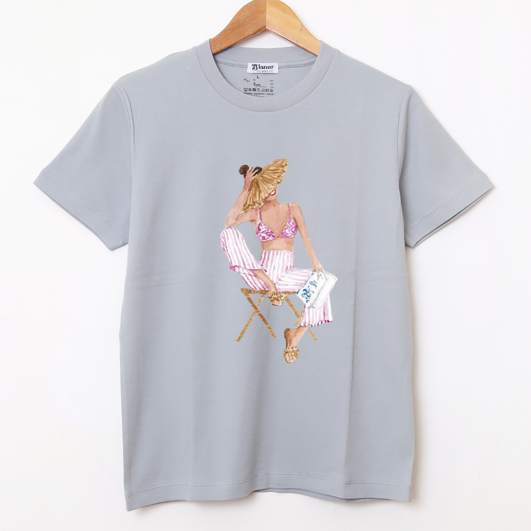 Chica Sentada cemento